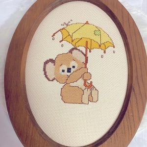 vintage cross-stitch kola bear in rain with wooden frame handmade